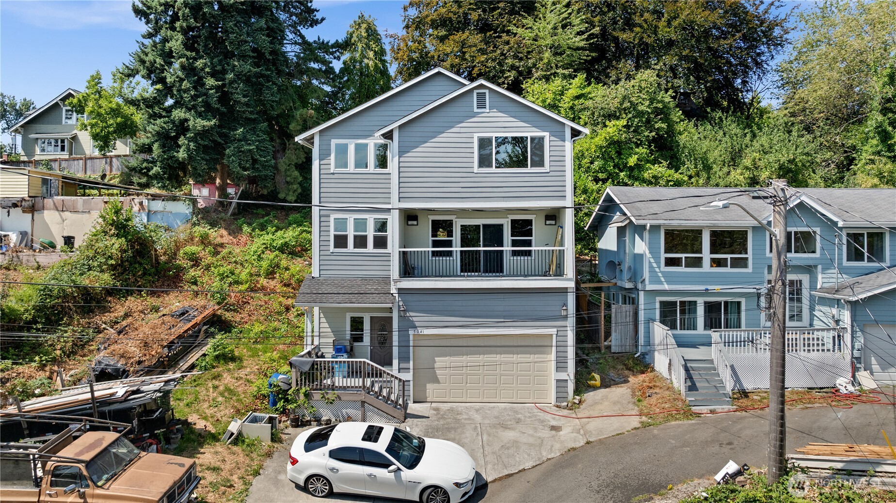 5039 31st Avenue South Seattle, WA 98108 - Photo 22 of 25 a front view of a house with a yard