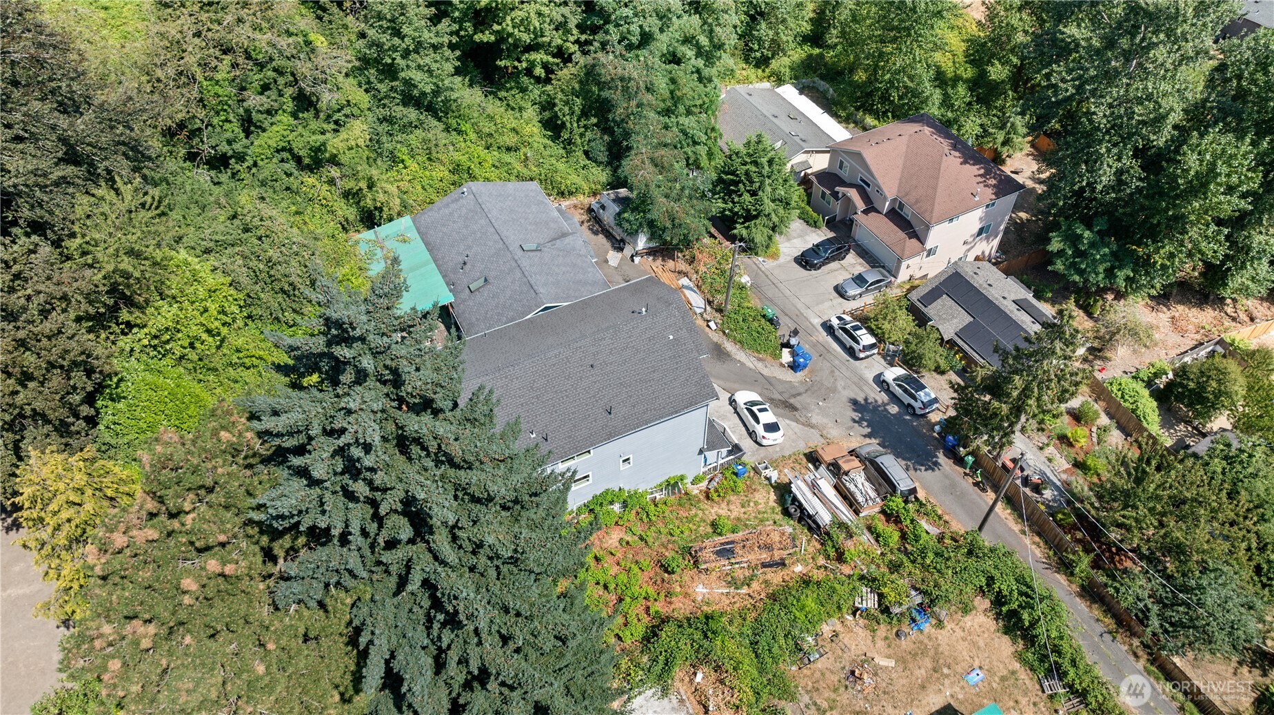 5039 31st Avenue South Seattle, WA 98108 - Photo 24 of 25 an aerial view of a house with a yard and garden