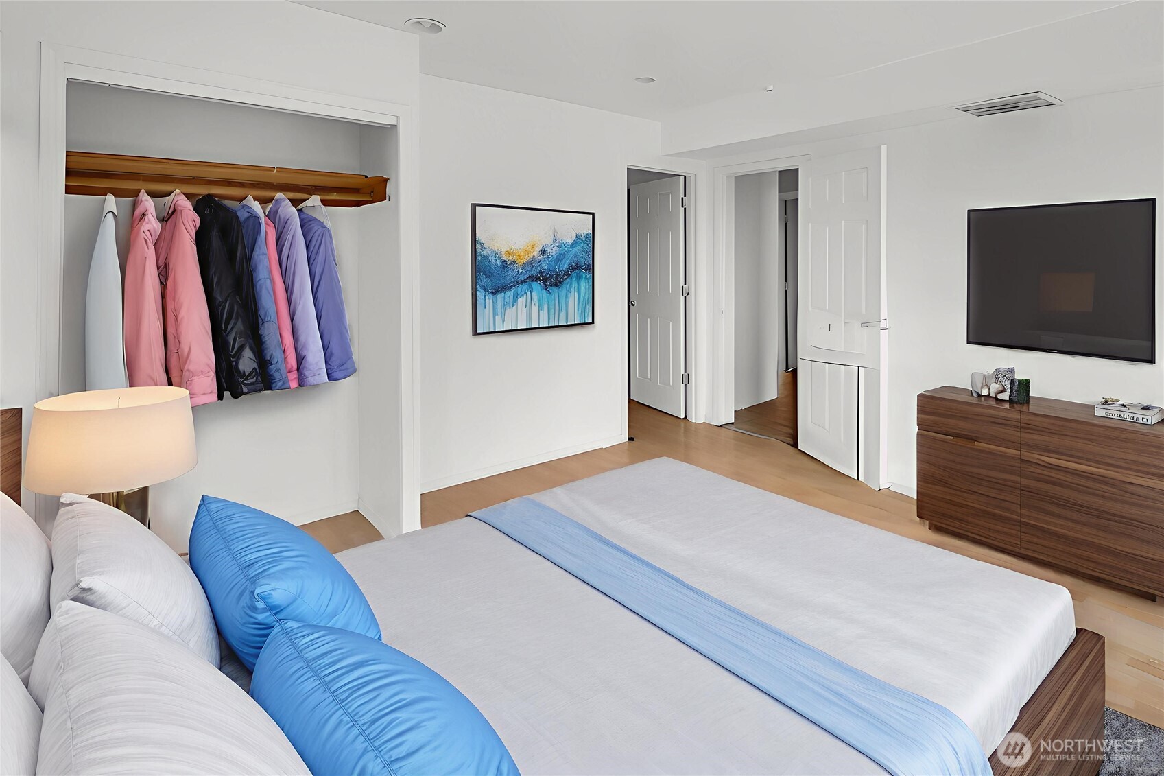 5039 31st Avenue South Seattle, WA 98108 - Photo 10 of 25 a bedroom with a bed and a flat screen tv