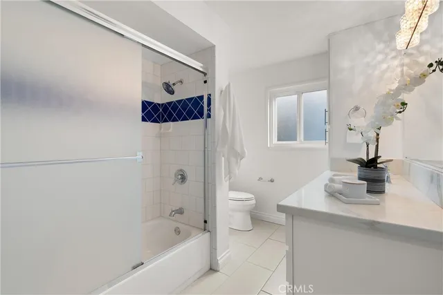 a bathroom with a bathtub and a sink