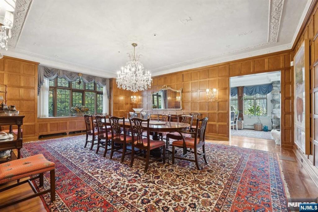 131 Rensselaer Road Essex Fells, NJ 07021 - Photo 15 of 48 a view of a dining room with furniture window and wooden floor