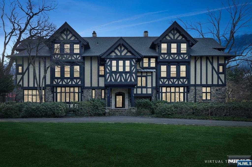 131 Rensselaer Road Essex Fells, NJ 07021 - Photo 44 of 48 a front view of a house with a yard