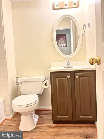 a bathroom with a toilet and a sink