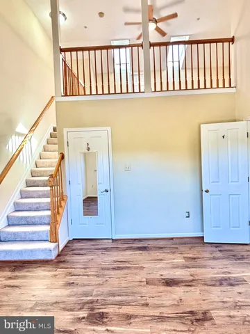 a view of a hardwood & staircase