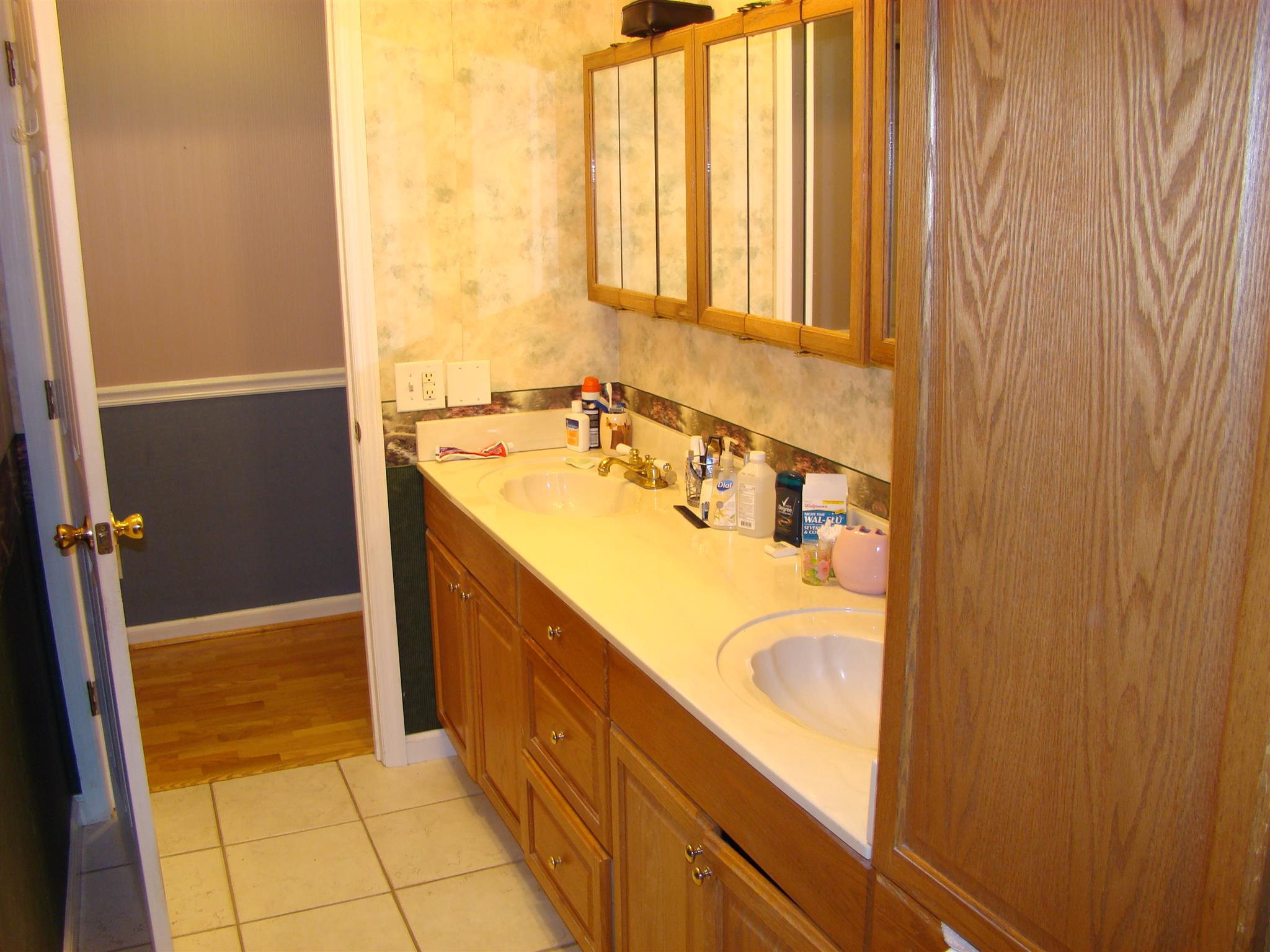 3579 Midland Road Bell Buckle, TN 37020 - Photo 11 of 30 a bathroom with a sink a mirror and a bathtub