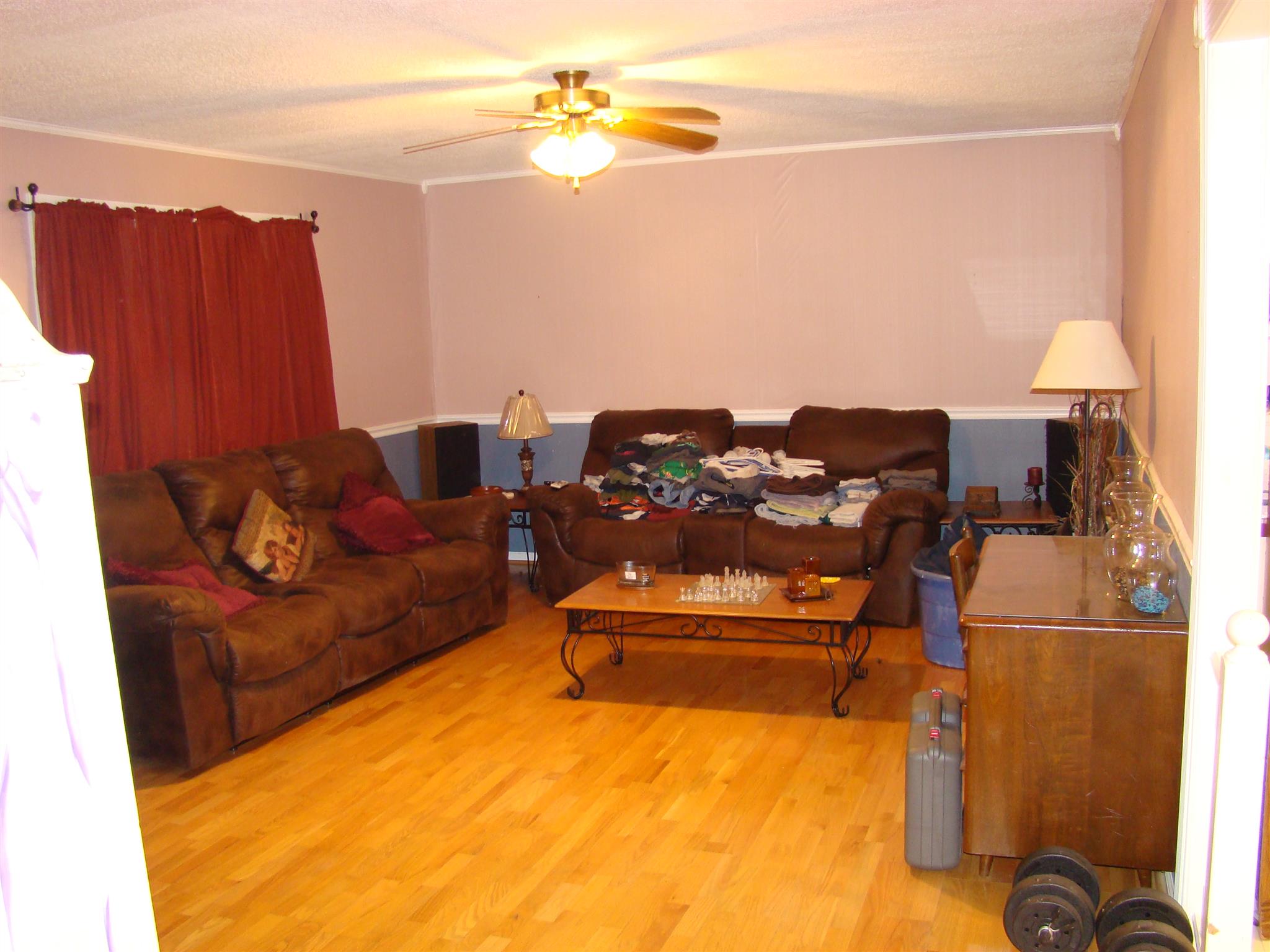 3579 Midland Road Bell Buckle, TN 37020 - Photo 13 of 30 a living room with furniture a lamp and a potted plant