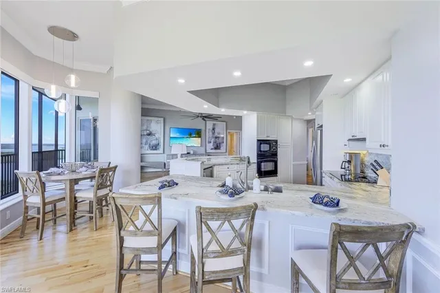 a kitchen with a stove and a sink