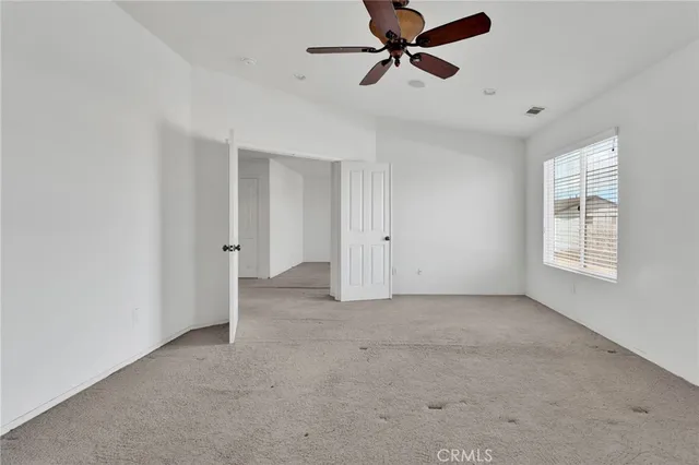 a bathroom with a sink mirror and vanity