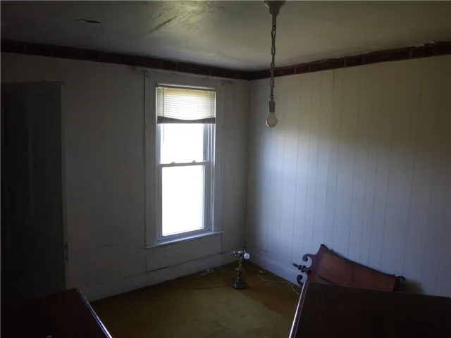 a room with window and a projector
