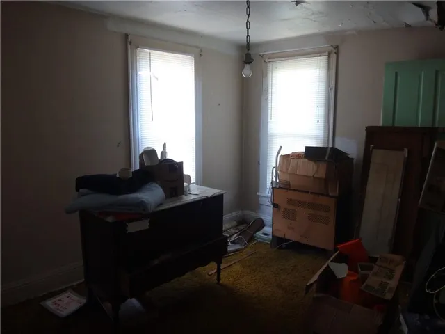 a room with furniture and window