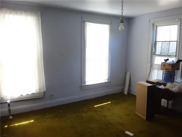 a bathroom with a tub and a shower