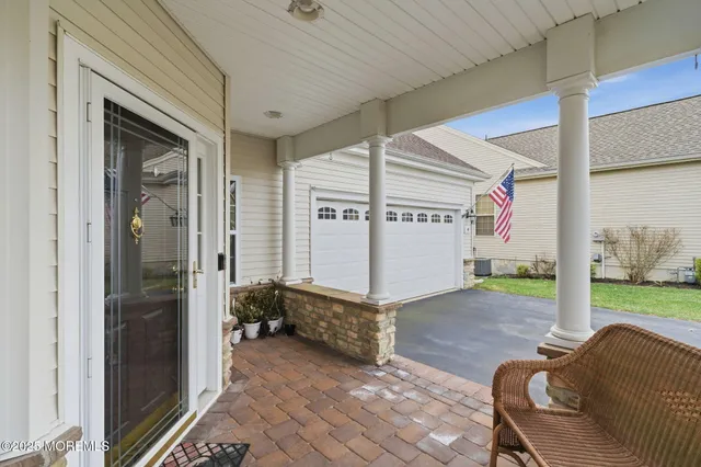 a view of a porch with furniture