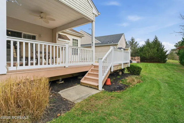 a view of deck with a yard