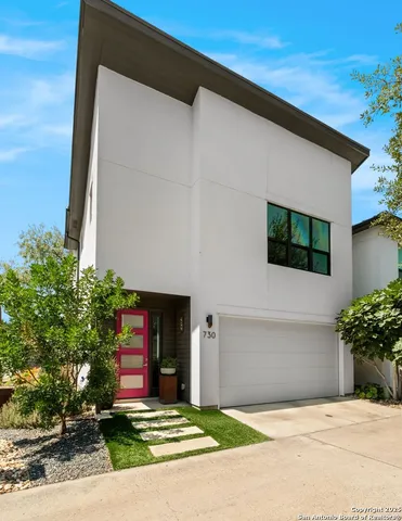a front view of a house with yard