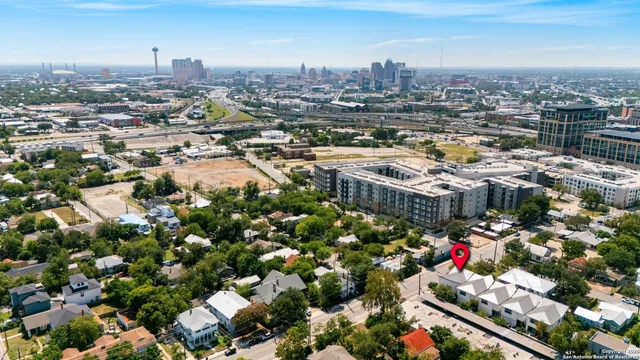an aerial view of a city with lots of residential buildings