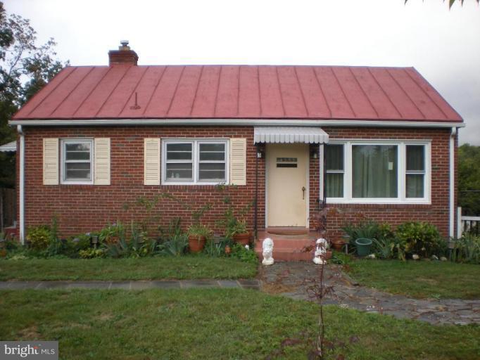 16014 Barnesville Road Boyds, MD 20841 - Photo 1 of 6 a front view of a house with a yard