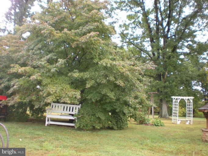 16014 Barnesville Road Boyds, MD 20841 - Photo 5 of 6 a view of a house with a yard