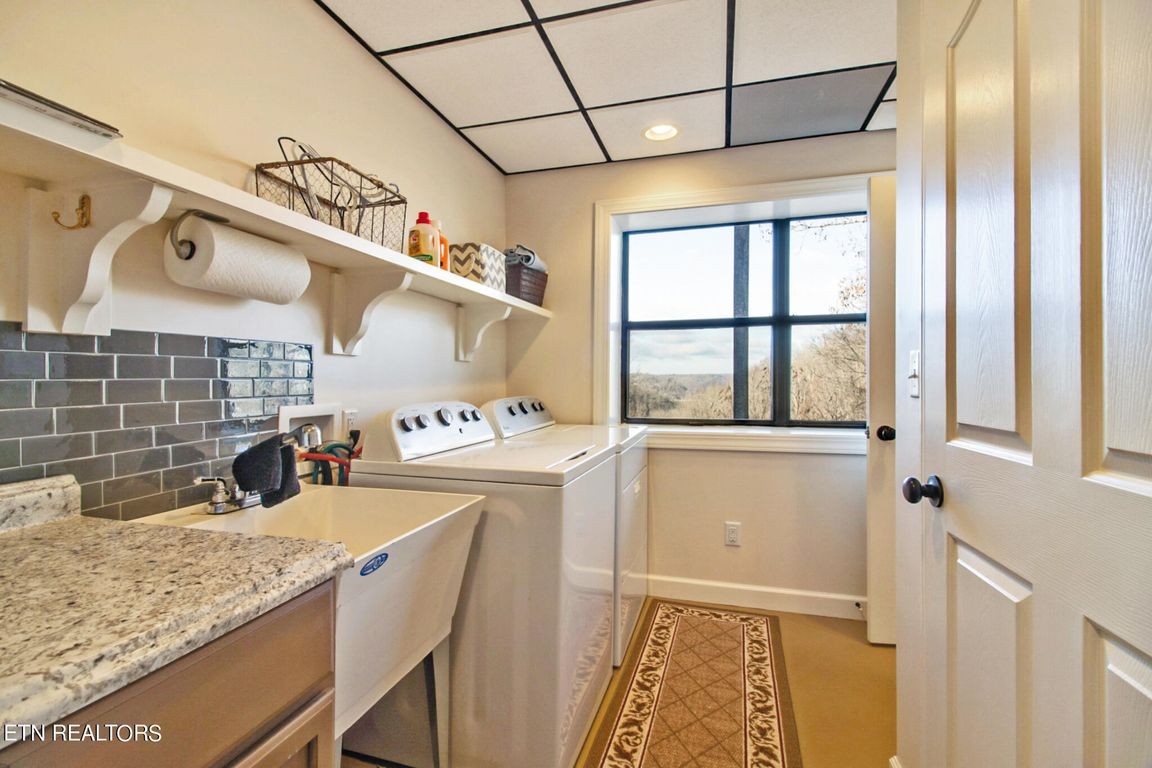 1375 Back Bone Road Sparta, TN 38583 - Photo 17 of 52 a view of a kitchen with a sink and wooden floor