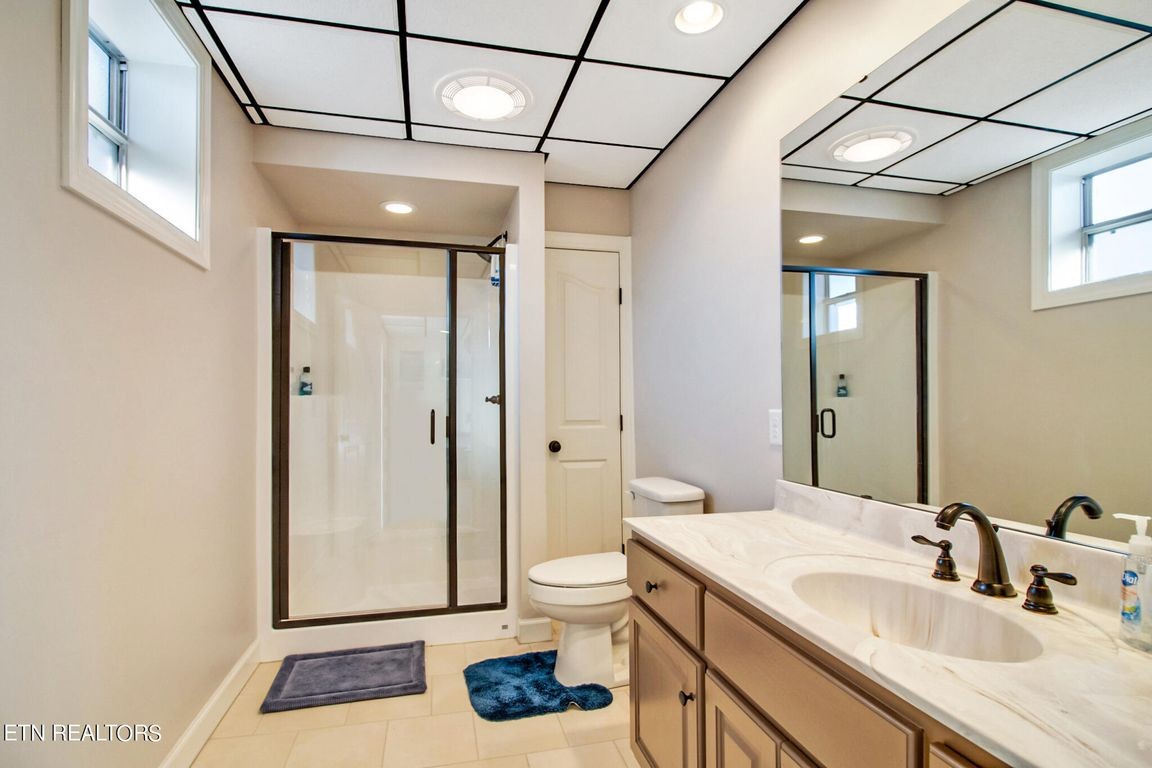 1375 Back Bone Road Sparta, TN 38583 - Photo 18 of 52 a bathroom with a sink a toilet and shower