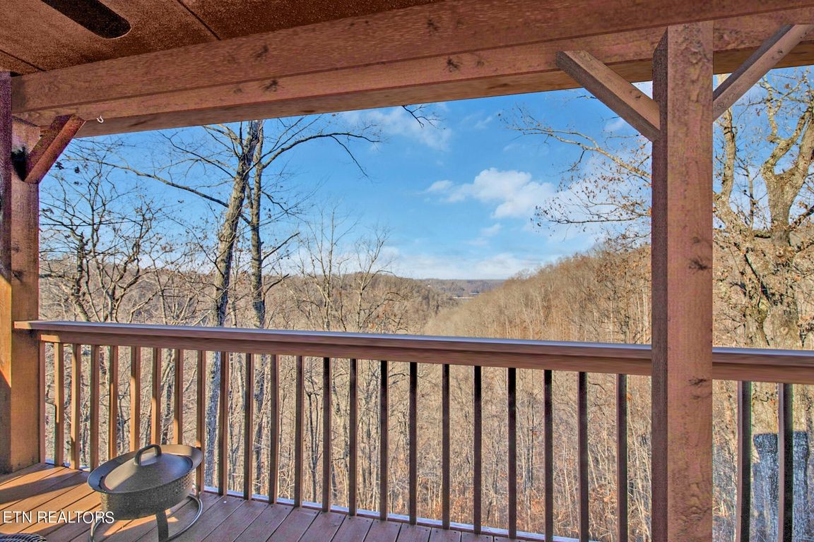 1375 Back Bone Road Sparta, TN 38583 - Photo 24 of 52 a view of a balcony with wooden floor