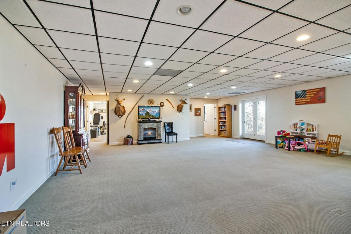 1375 Back Bone Road Sparta, TN 38583 - Photo 35 of 52 a view of a livingroom with furniture and a chandelier