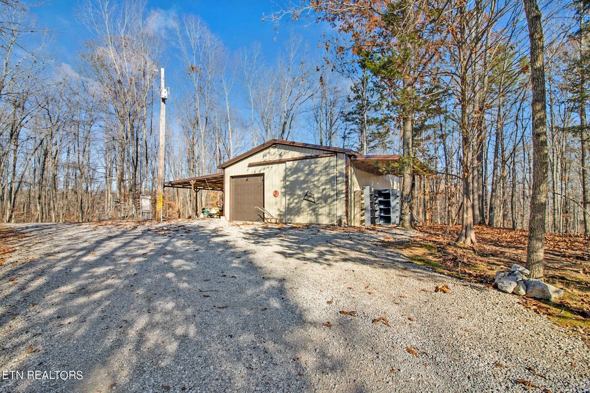 1375 Back Bone Road Sparta, TN 38583 - Photo 44 of 52 a front view of a house with a yard