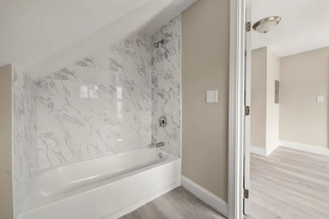 a bathroom with a bathtub