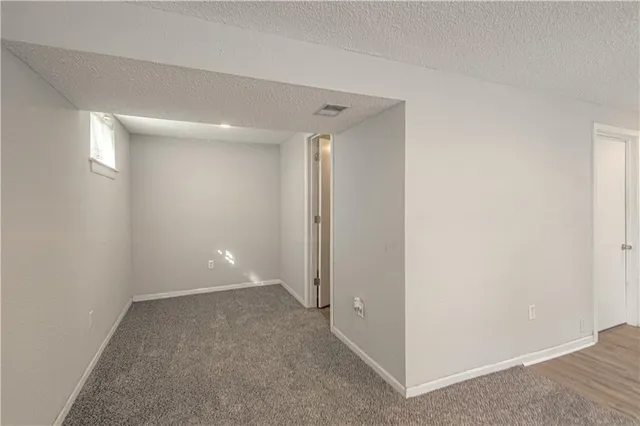 $265,500 | 404 Northeast Castle Drive, Lee's Summit, MO 64086