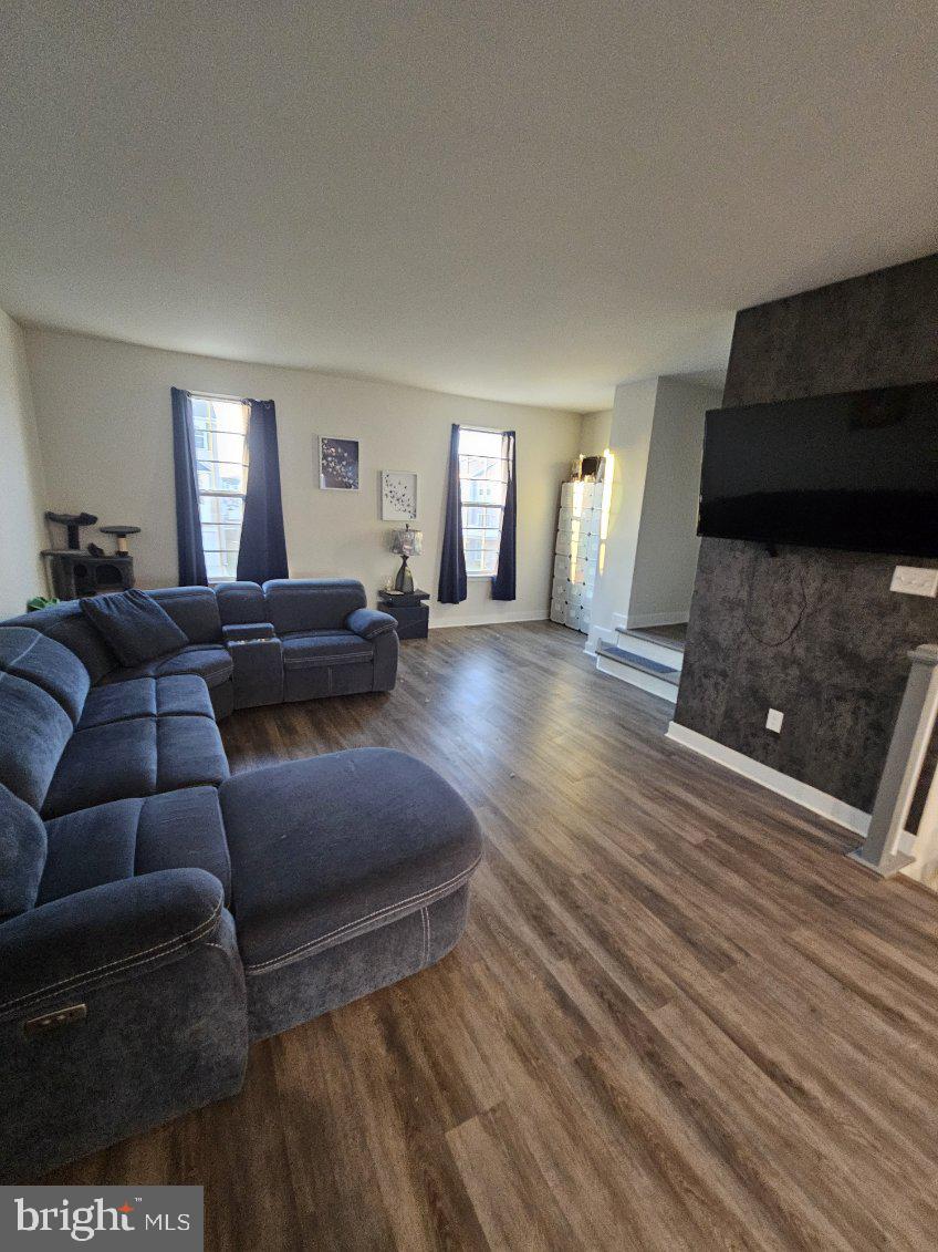 108 Freedom Way Sicklerville, NJ 08081 - Photo 5 of 9 a living room with furniture and a fireplace