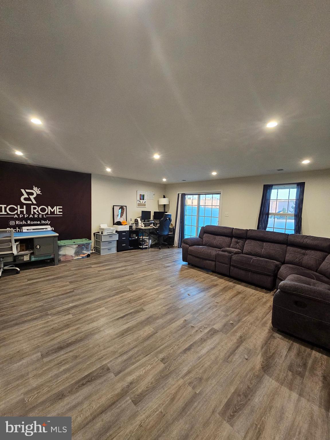108 Freedom Way Sicklerville, NJ 08081 - Photo 8 of 9 a living room with furniture and a flat screen tv