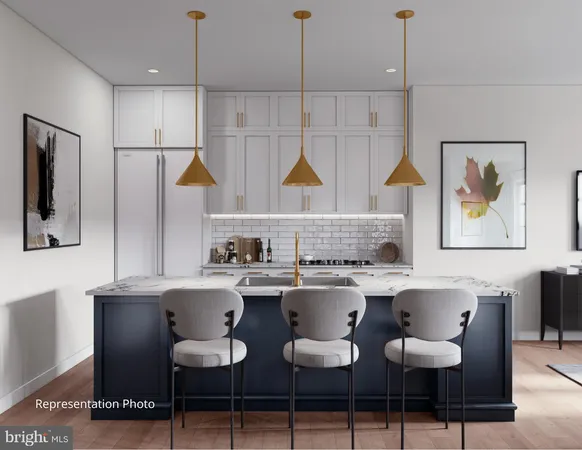 a kitchen with a dining table and chairs