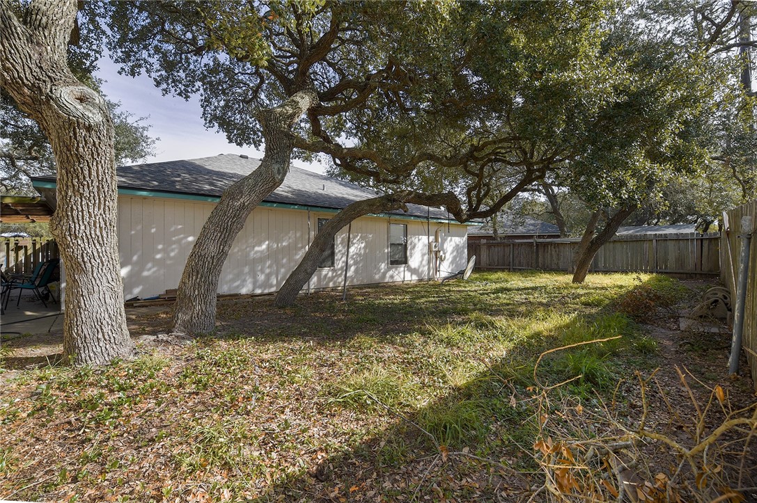 2101 Capeheart Street Ingleside, TX 78362 - Photo 34 of 39 a view of a yard with large tree