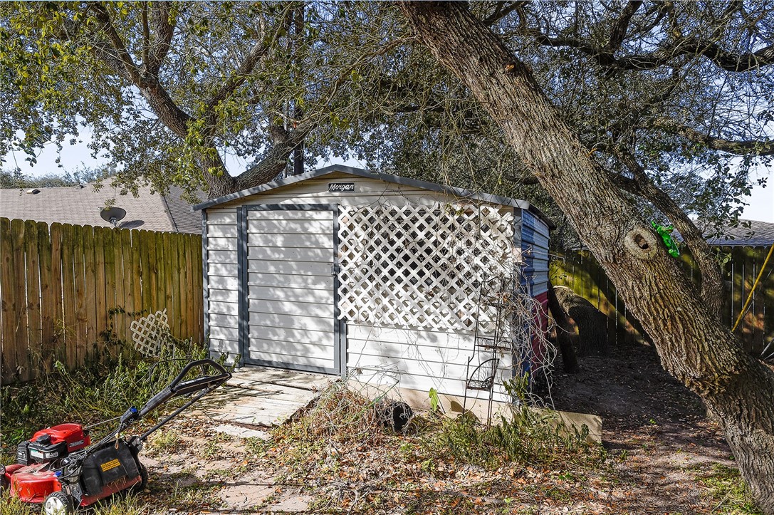 2101 Capeheart Street Ingleside, TX 78362 - Photo 35 of 39 a front view of a house with a yard