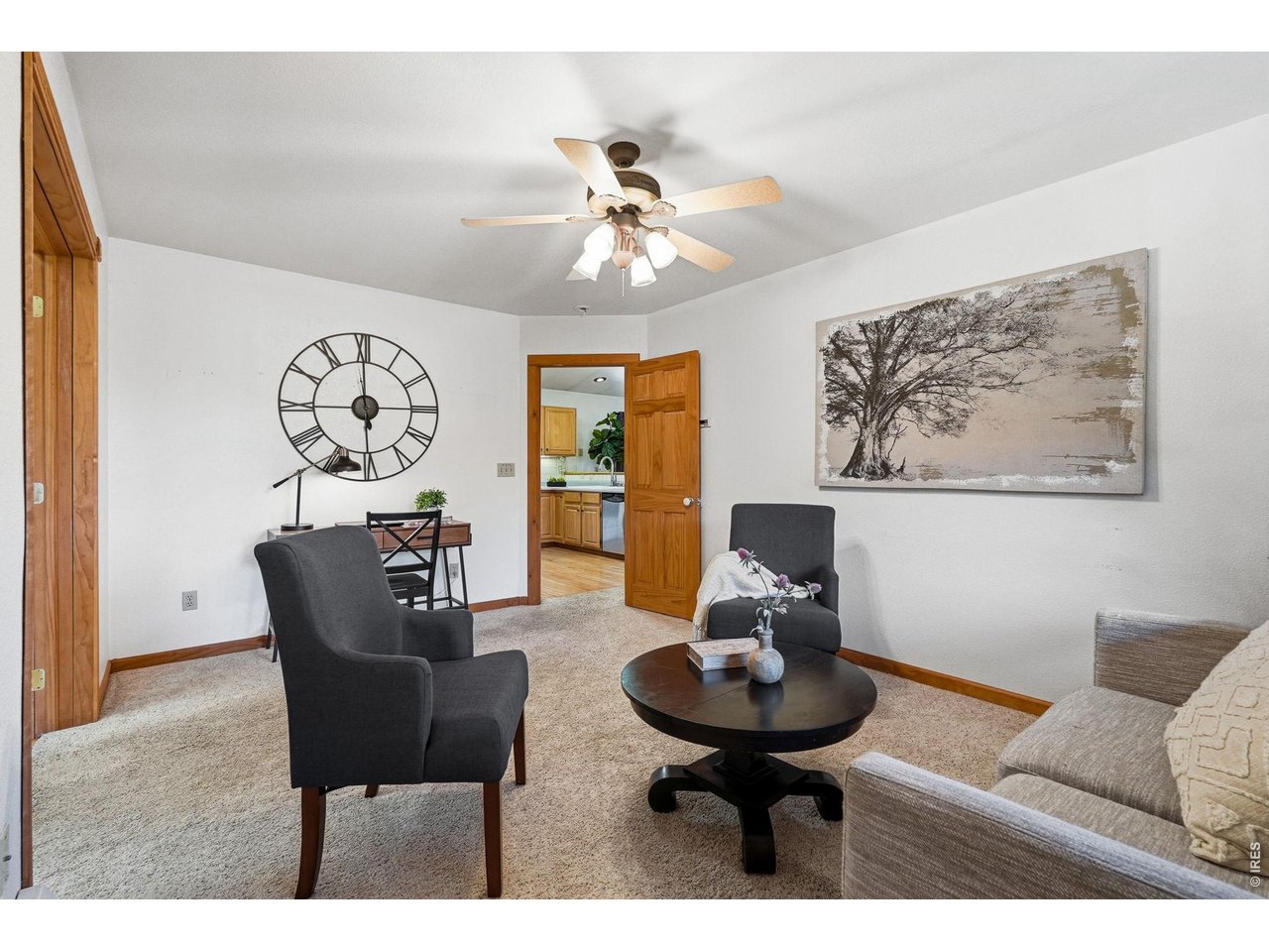 560 Quillan Gulch Road Loveland, CO 80537 - Photo 12 of 49 Bonus room between Kitchen and Primary Bedroom