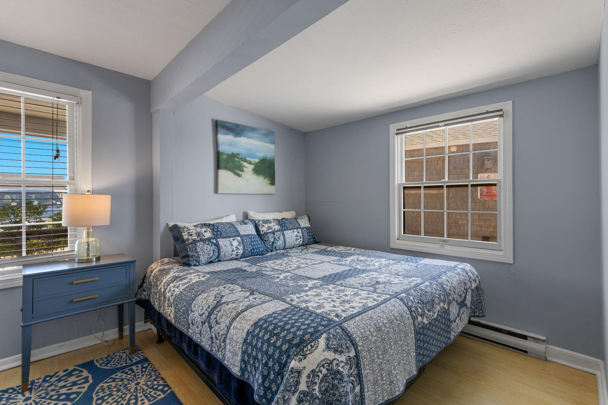 538 Shore Road, Unit 3 Truro, MA 02666 - Photo 12 of 27 a bedroom with a bed and window