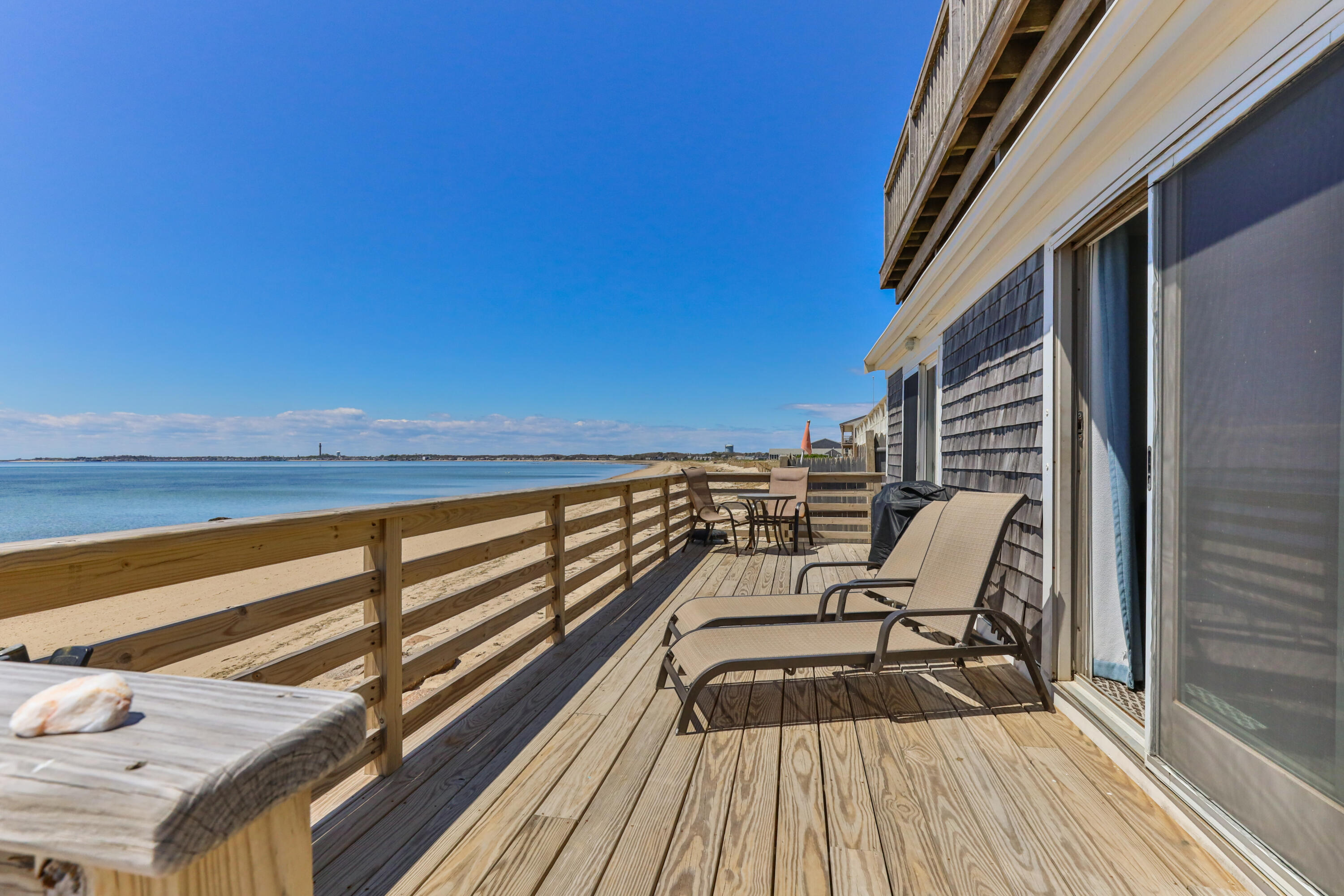 538 Shore Road, Unit 3 Truro, MA 02666 - Photo 15 of 27 a view of balcony with wooden floor and seating space