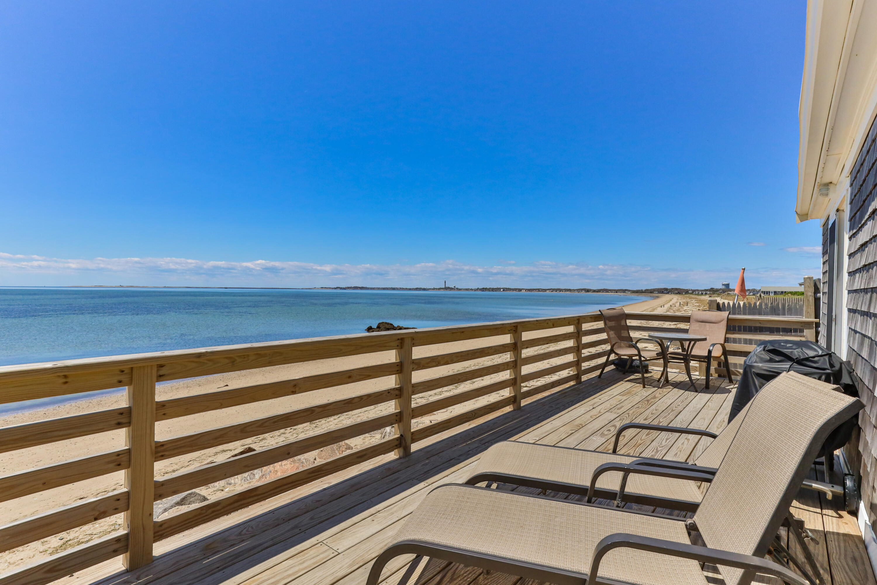 538 Shore Road, Unit 3 Truro, MA 02666 - Photo 20 of 27 a view of a roof deck with a couple of chairs