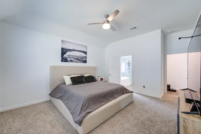a bathroom with a tub and a shower