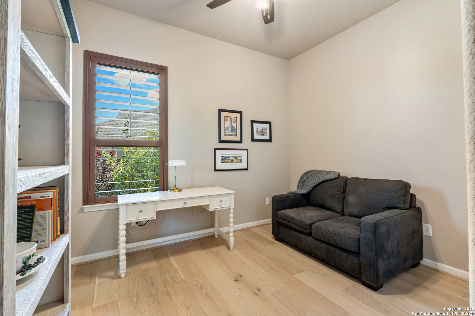 123 Gaucho Boerne, TX 78006 - Photo 17 of 26 a living room with furniture and a fireplace