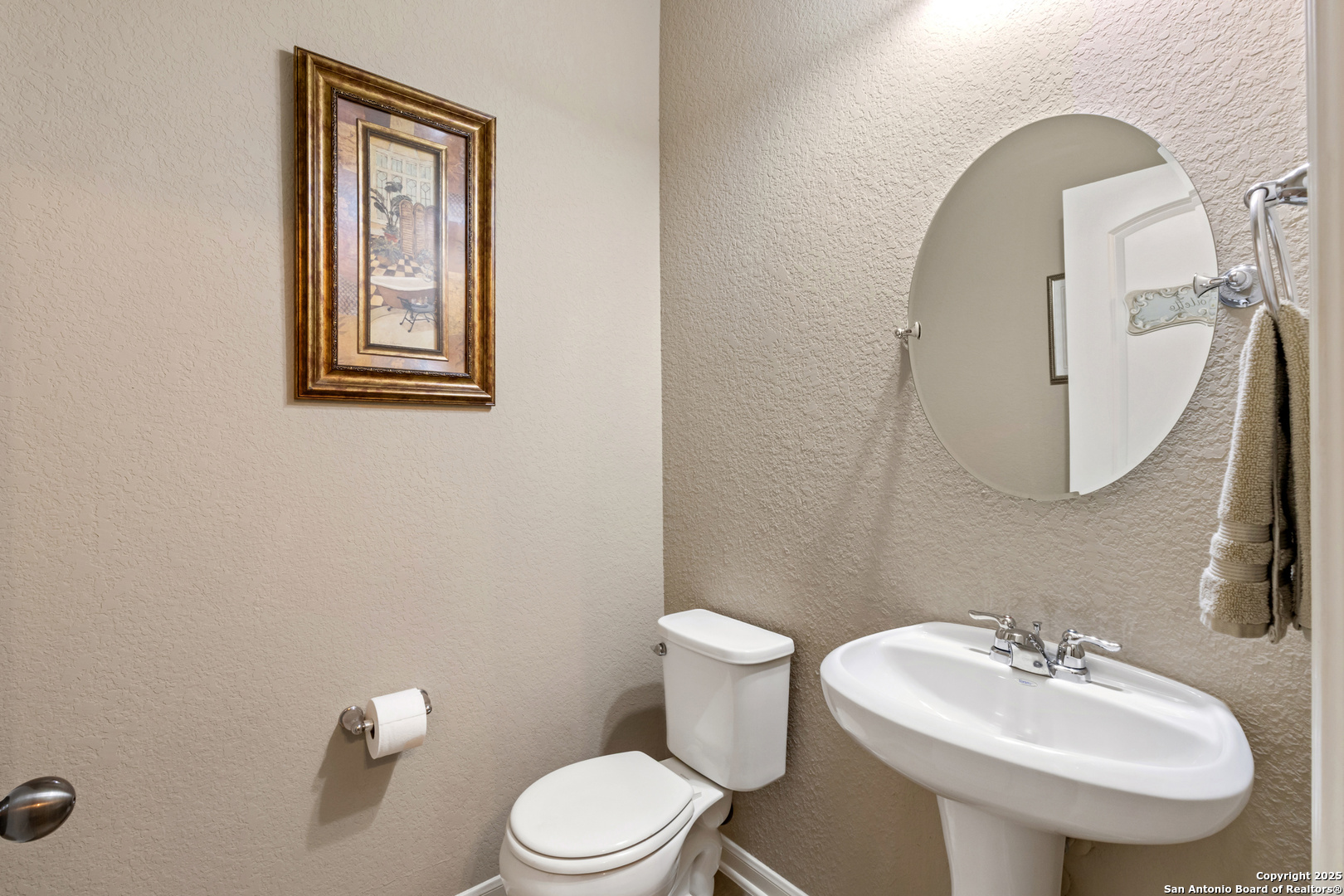 123 Gaucho Boerne, TX 78006 - Photo 18 of 26 a bathroom with a toilet sink and mirror