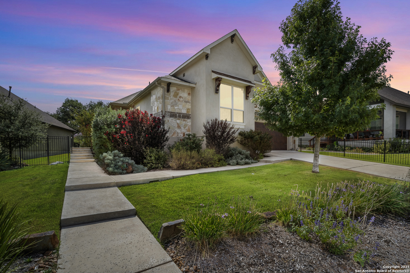 123 Gaucho Boerne, TX 78006 - Photo 2 of 26 a front view of a house with garden