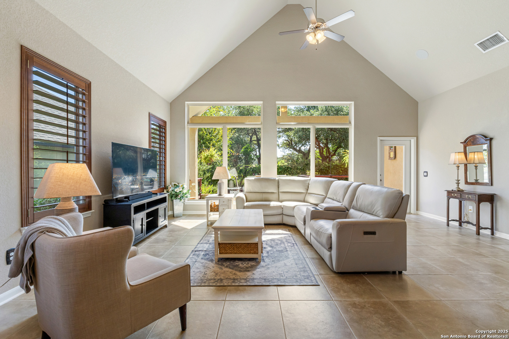 123 Gaucho Boerne, TX 78006 - Photo 5 of 26 a living room with furniture and a flat screen tv
