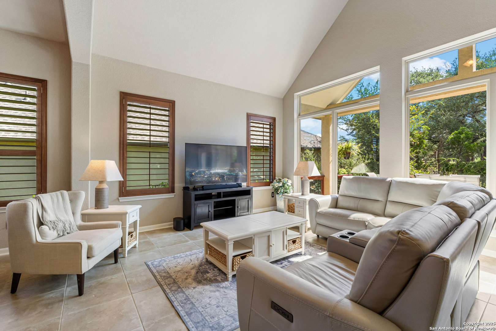 123 Gaucho Boerne, TX 78006 - Photo 7 of 26 a living room with furniture fireplace and a large window