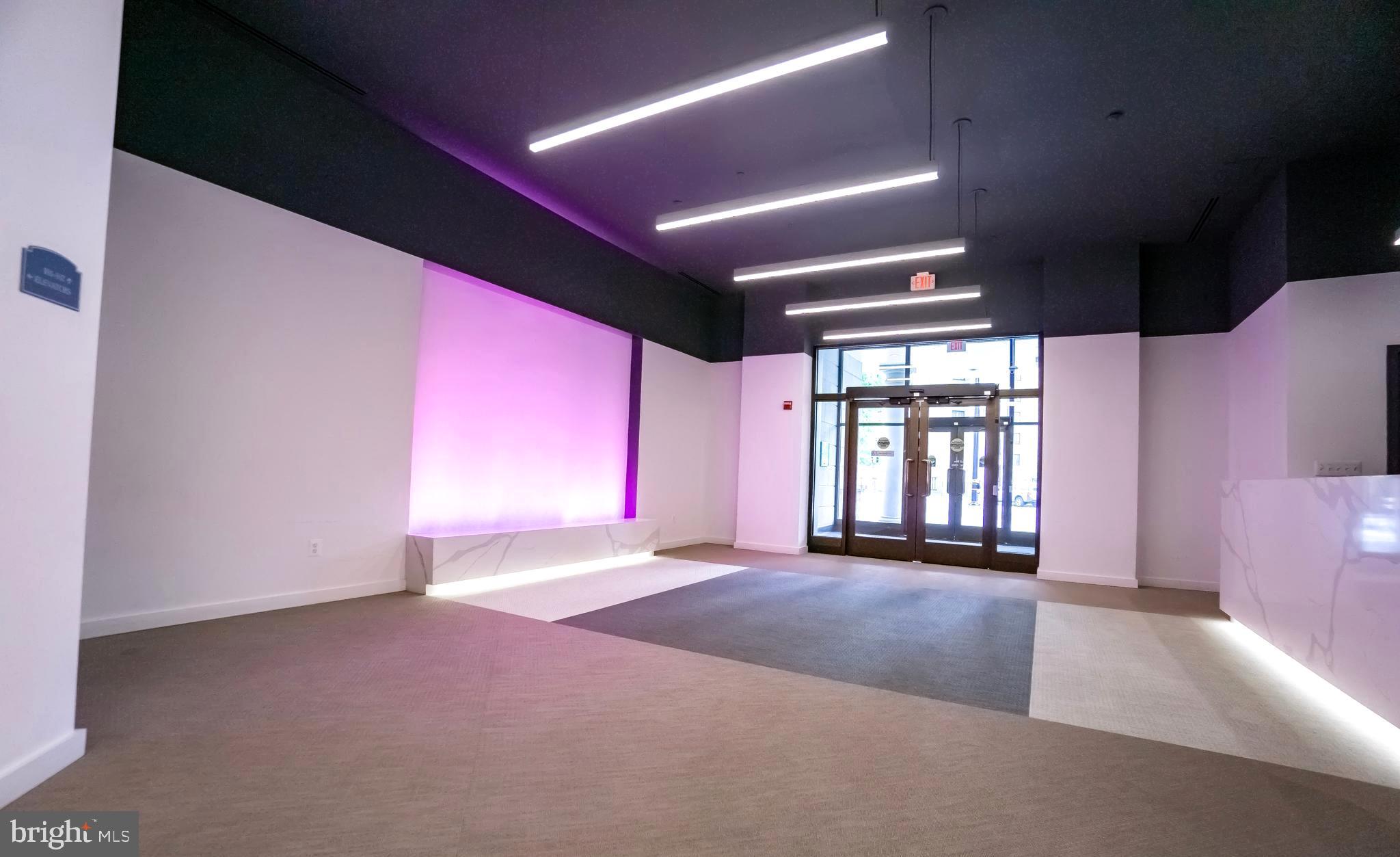 2750 14th Street Northwest, Unit 207 Washington, DC 20009 - Photo 2 of 17 Building lobby and concierge desk area.