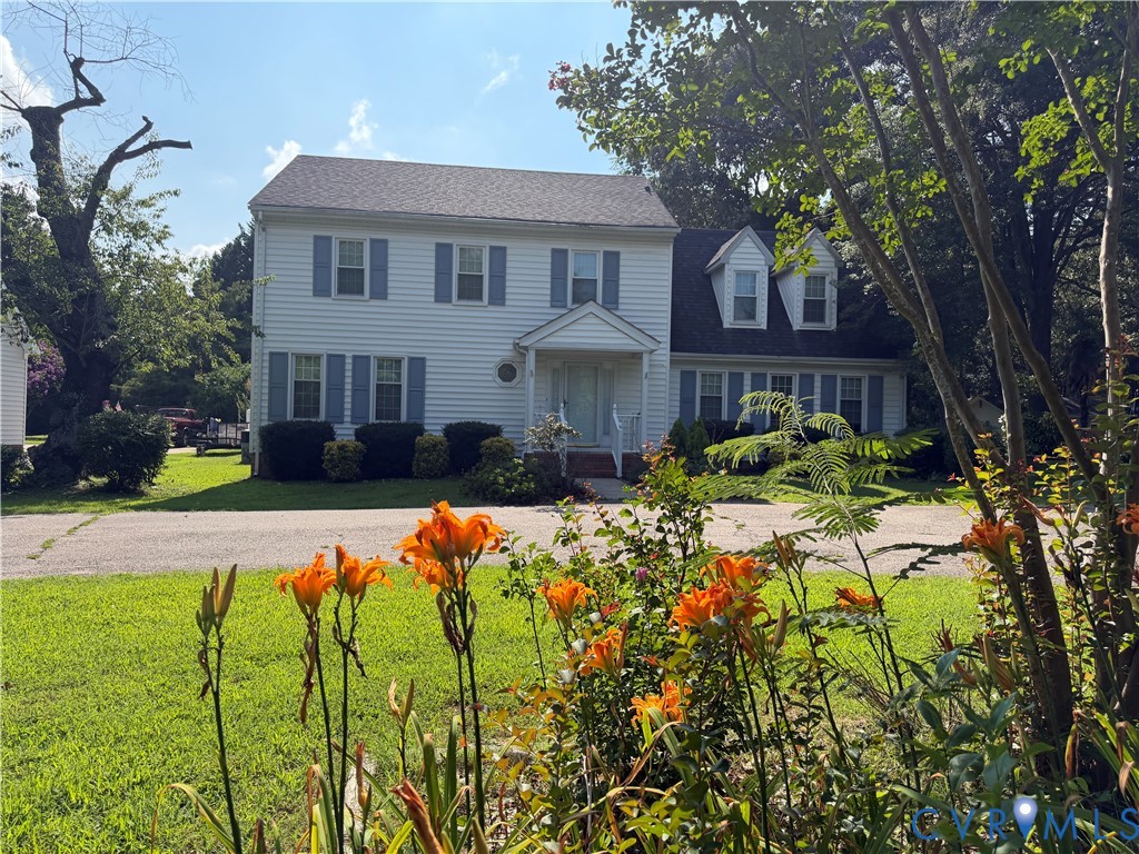 1760 Gloucester Road Gloucester Point, VA 23062 - Photo 1 of 2 Two-story residence featuring white siding and a d