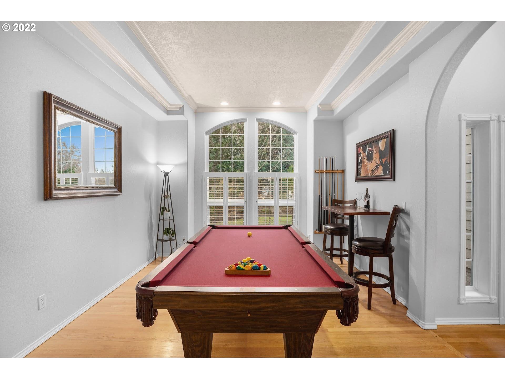 16625 Southwest Springwater Court Beaverton, OR 97006 - Photo 5 of 32 a room with pool table and windows