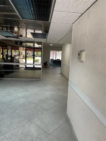 a view of empty room with a window