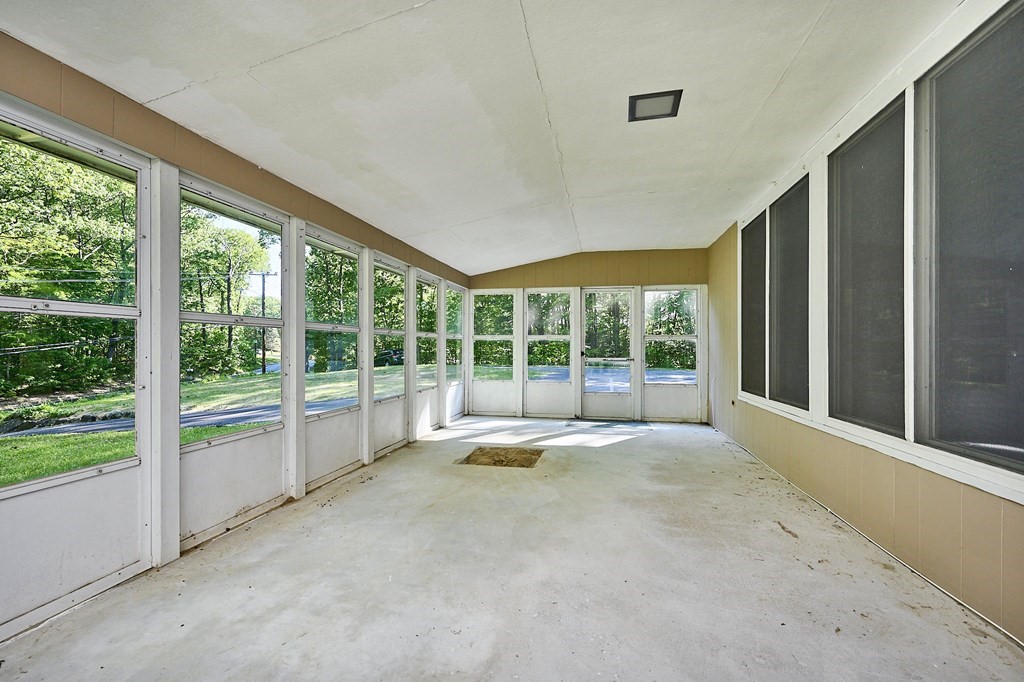 20 Southampton Road Holyoke, MA 01040 - Photo 3 of 28 a view of an empty room with wooden floor and a window
