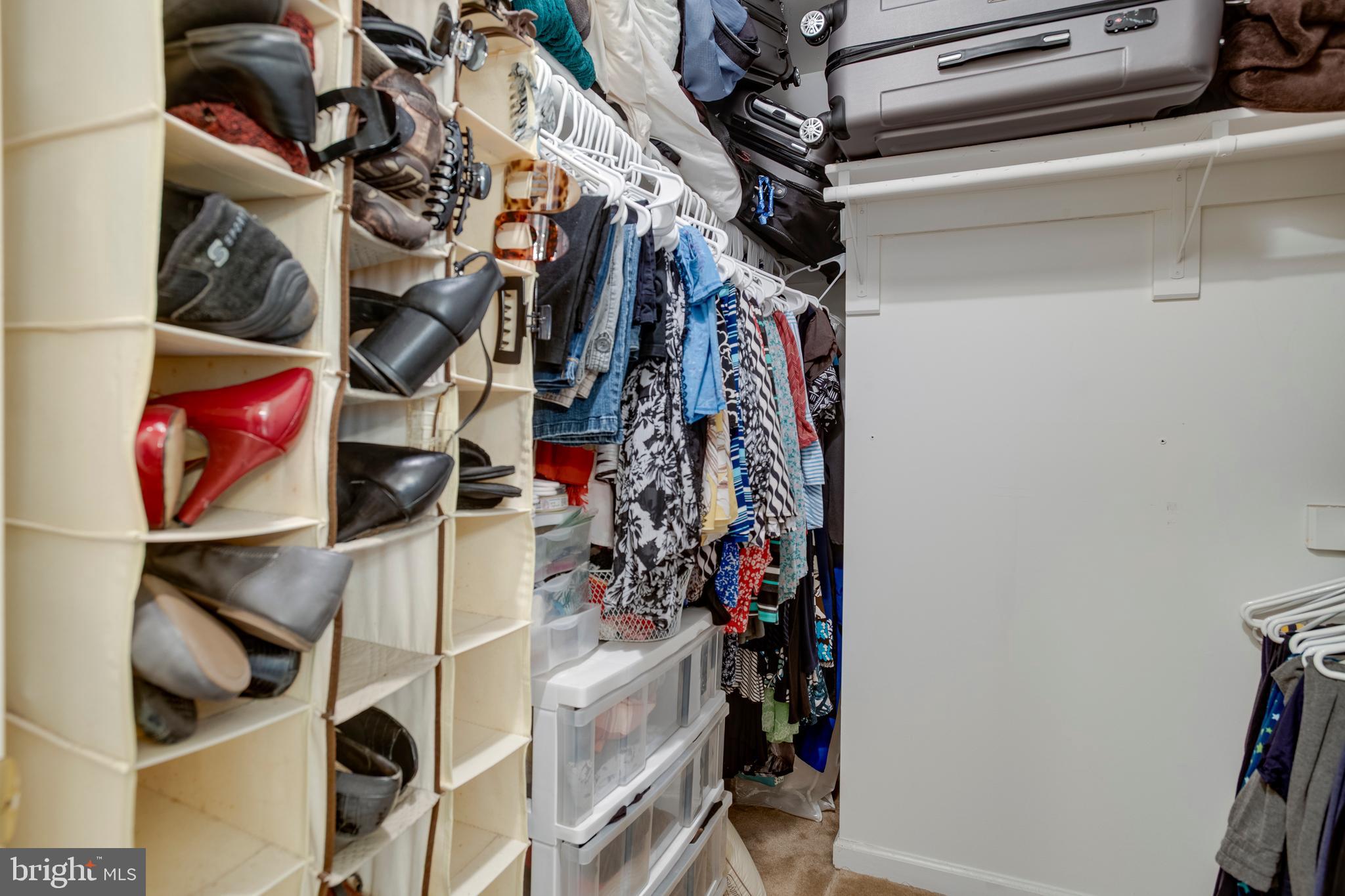 101 Saylers Creek Road Locust Grove, VA 22508 - Photo 31 of 81 a view of walk in closet with clothes and shoes
