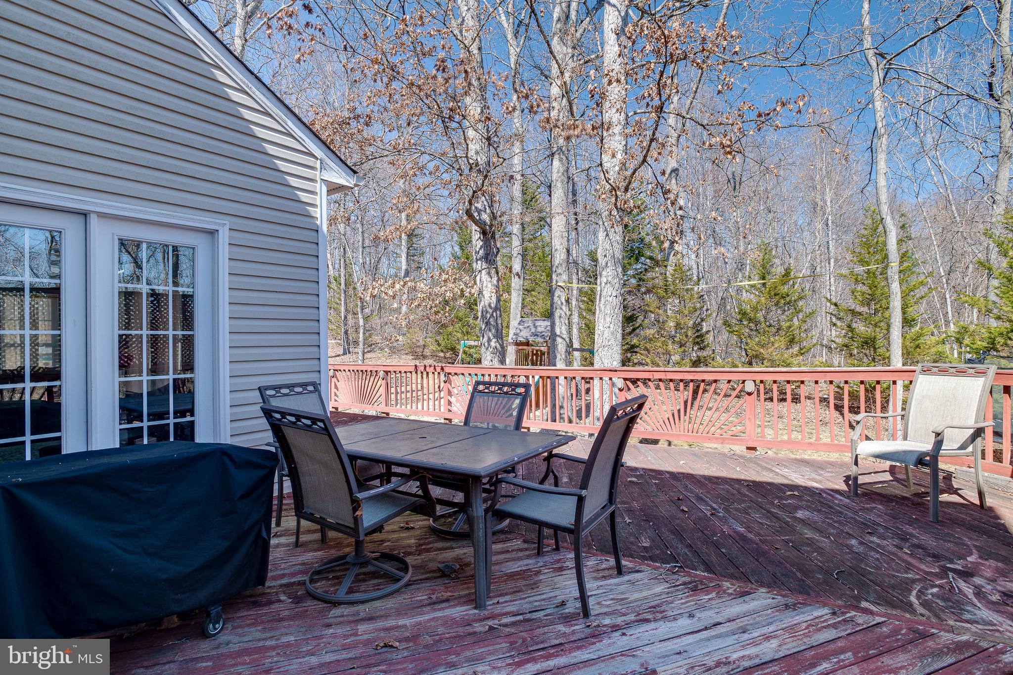 101 Saylers Creek Road Locust Grove, VA 22508 - Photo 56 of 81 a view of a chairs and table in patio